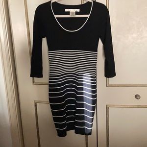 Body skimming beautiful hardly worn sweater dress. VERY flattering!